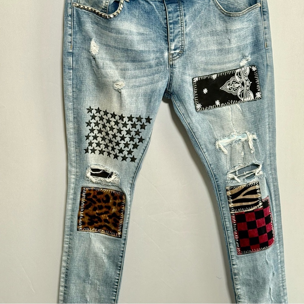 AMIRI Light Blue Skinny Jeans with Patterned Patches